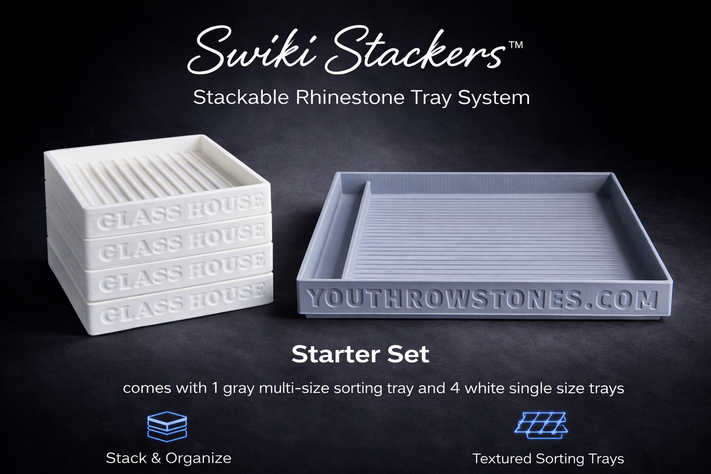 One large grays stackable rhinestone tray with tool holder and four smaller white rhinestone trays.